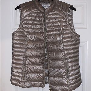 A silver vest. Used.